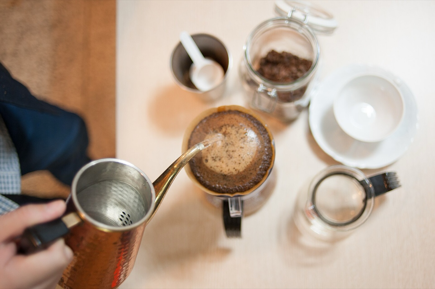 Manual drip coffee prepared with a paper filter.